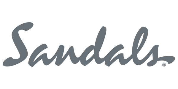 Sandals Resorts logo in gray script font on white background.