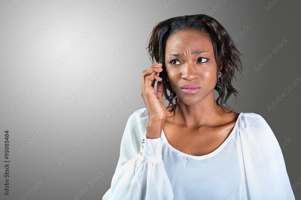 A woman talking on a phone