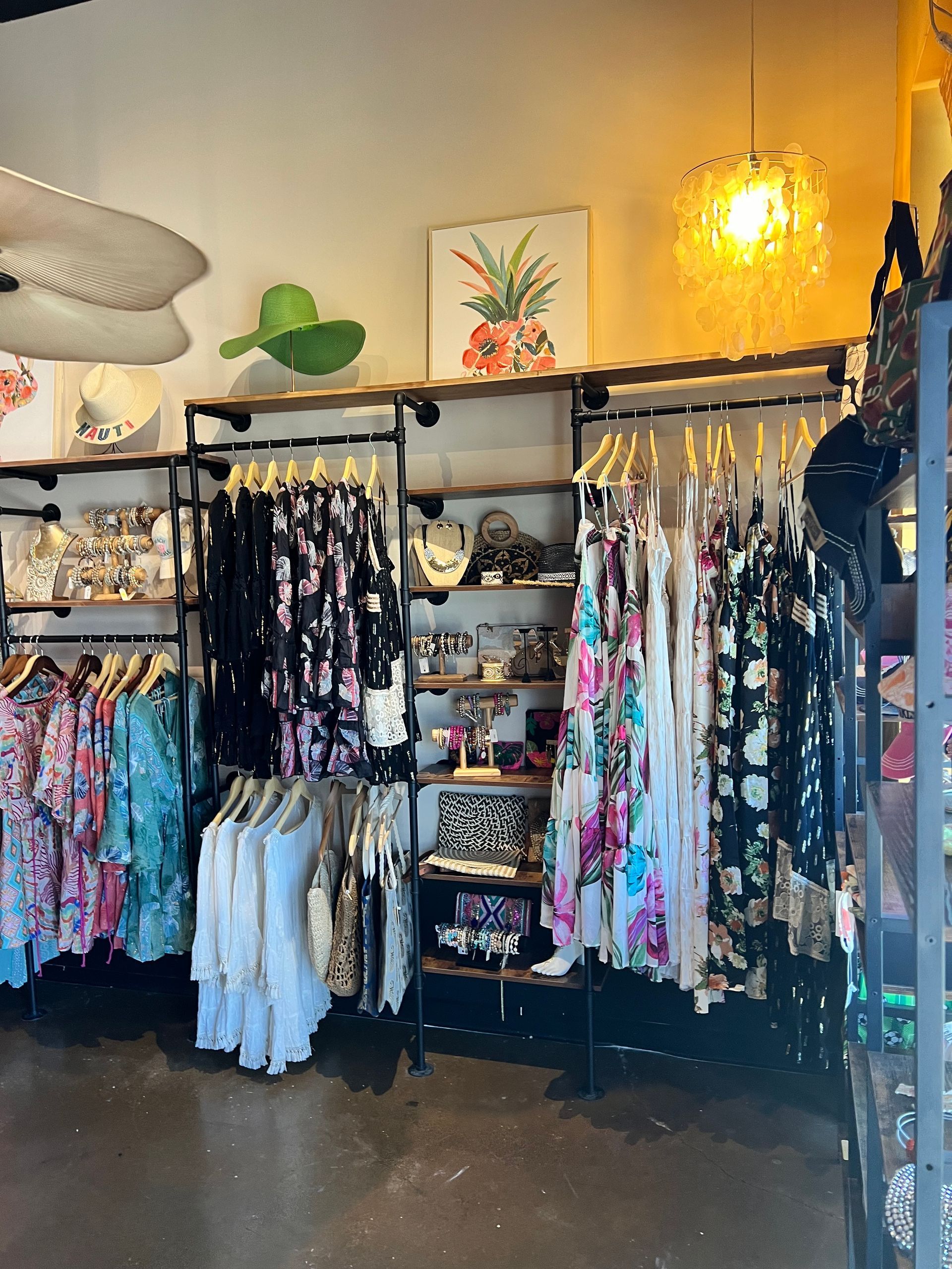 A store filled with lots of clothes and hats