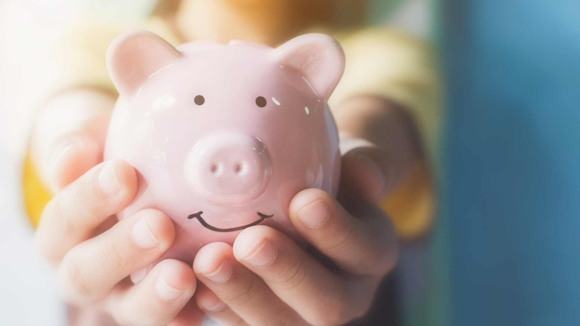 Glass piggy bank being handed out. 