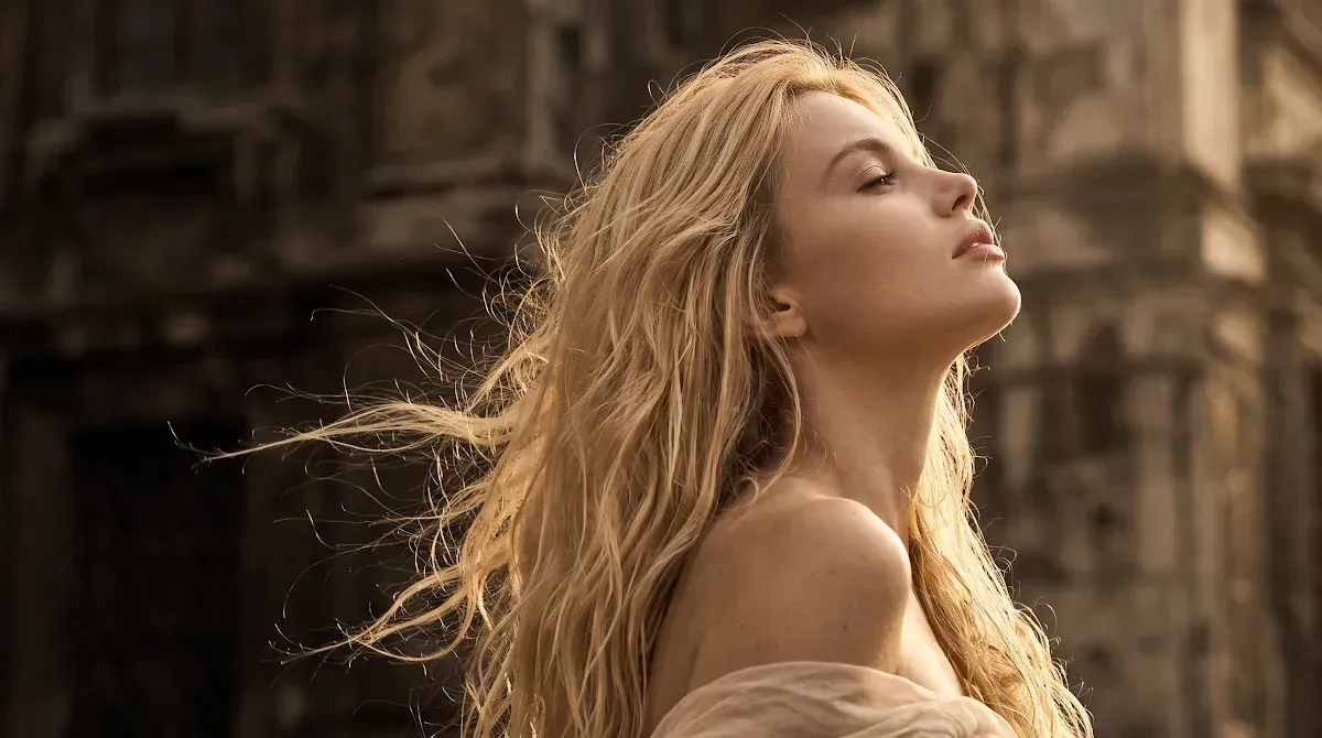 Person holding healthy, beautiful hair