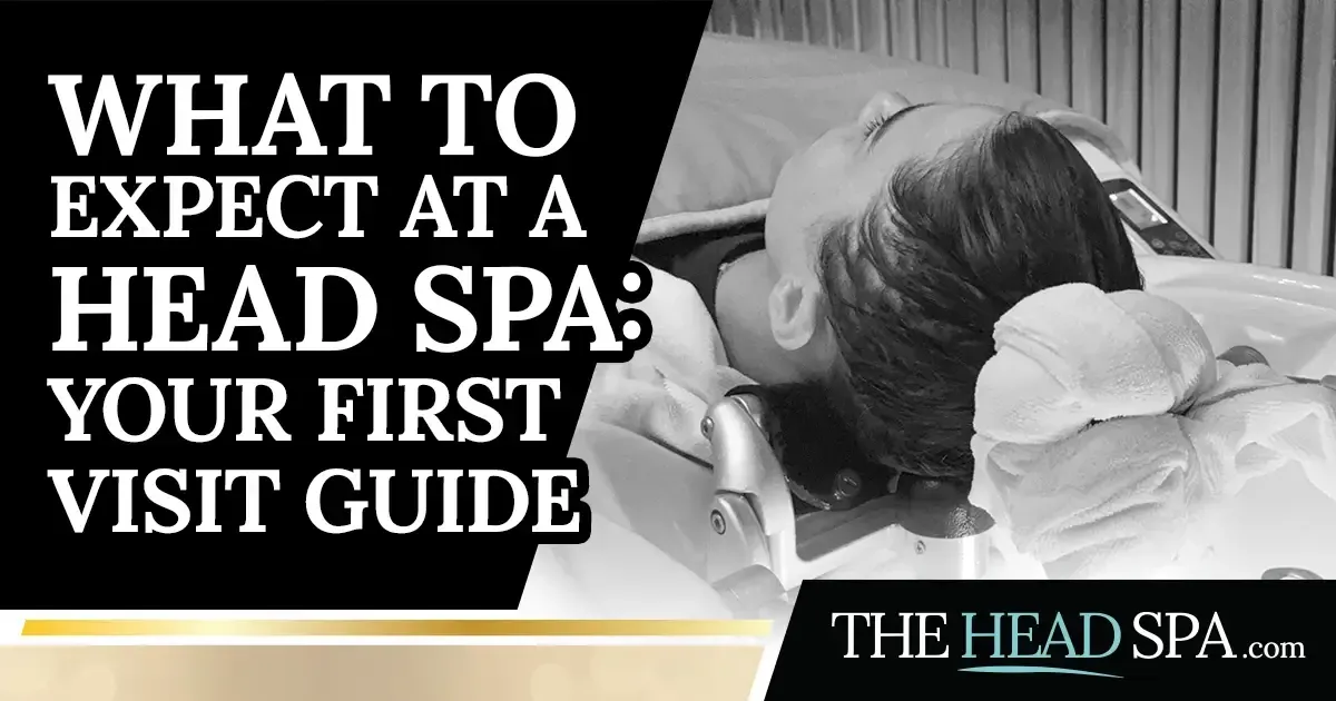 Client lying back with eyes closed at a head spa treatment basin with a towel under their head