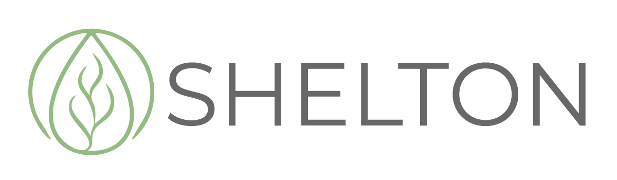 The Shelton Logo - Footer, Click to go home