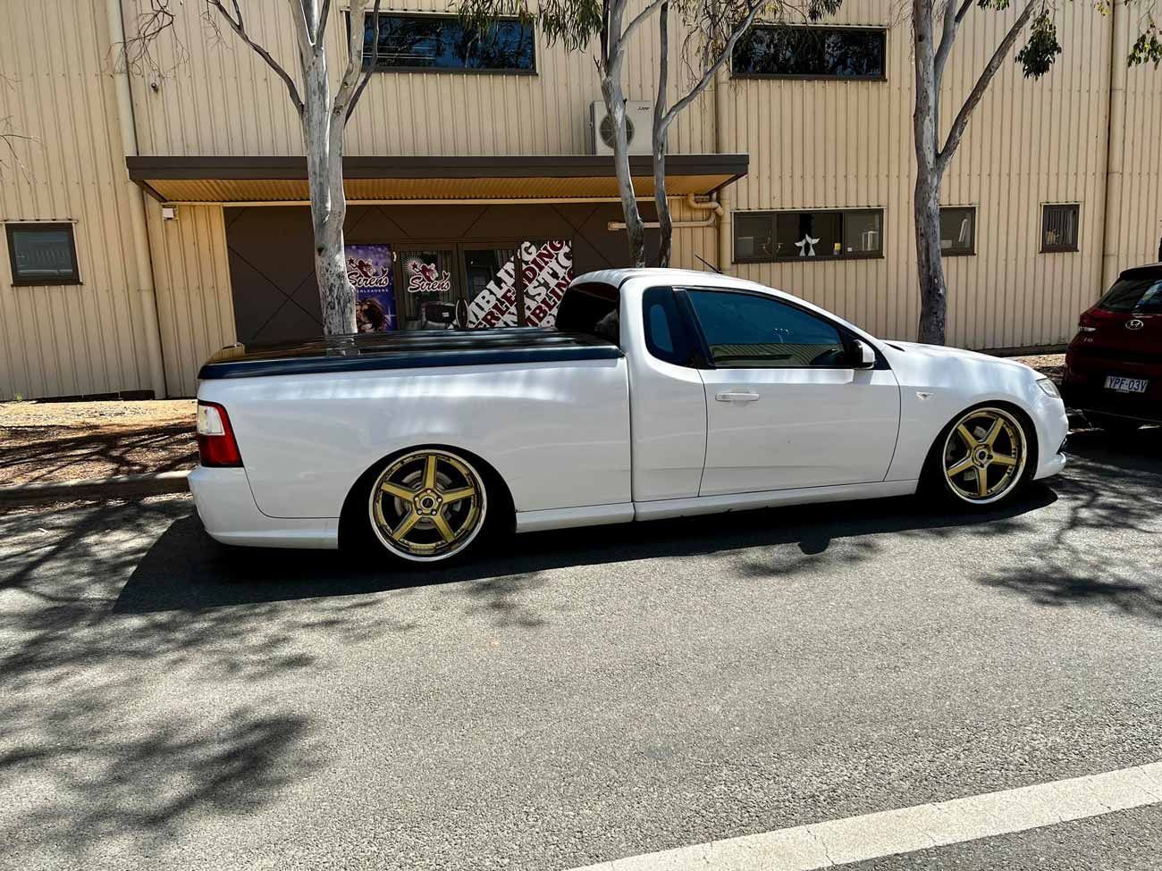 Parked White Ute — Trusted Car Mechanic in Canberra