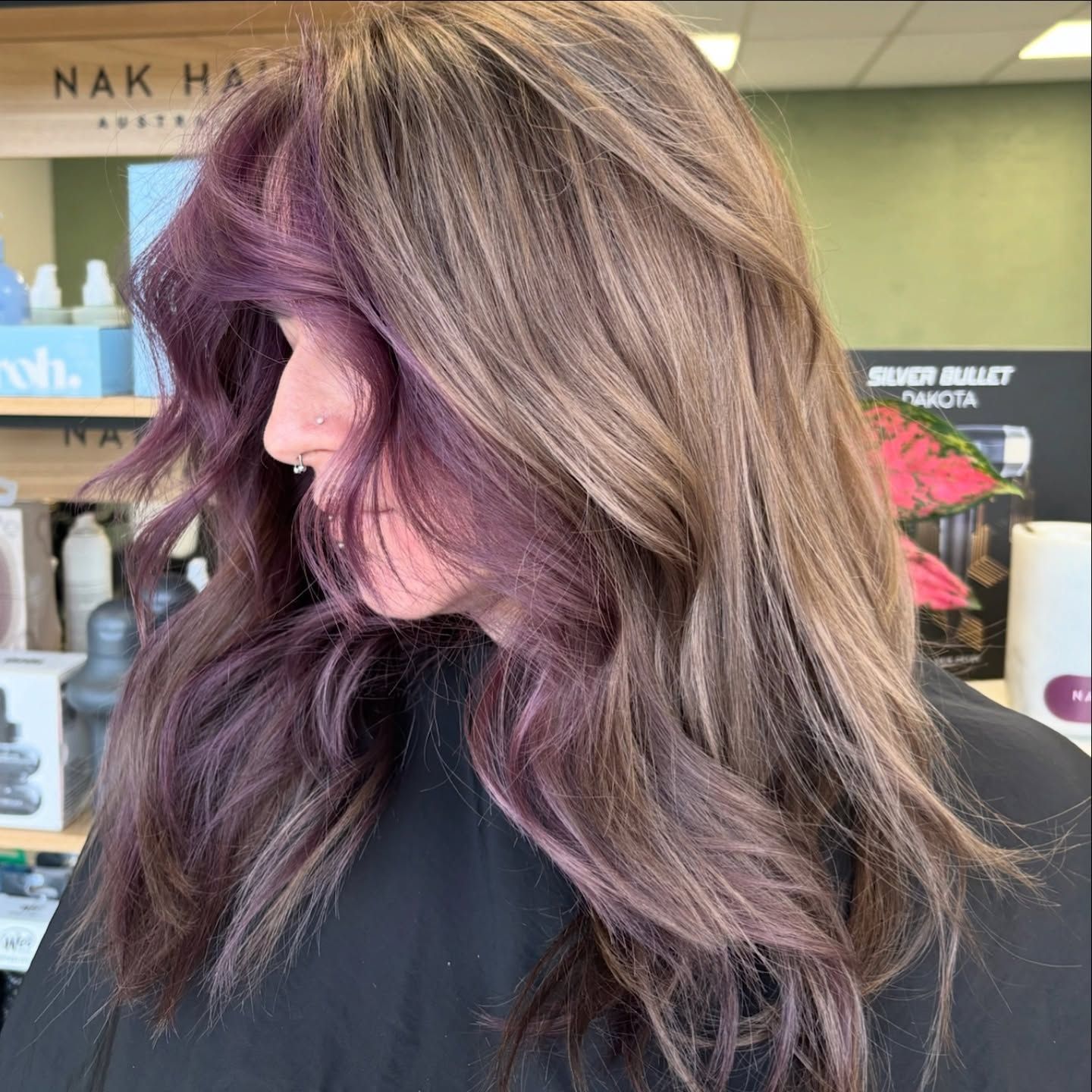 Side-profile Of Wavy, Layered Brunette Hair With Blonde Highlights In A Salon Setting — Blackwell Hair In Woree, QLD
