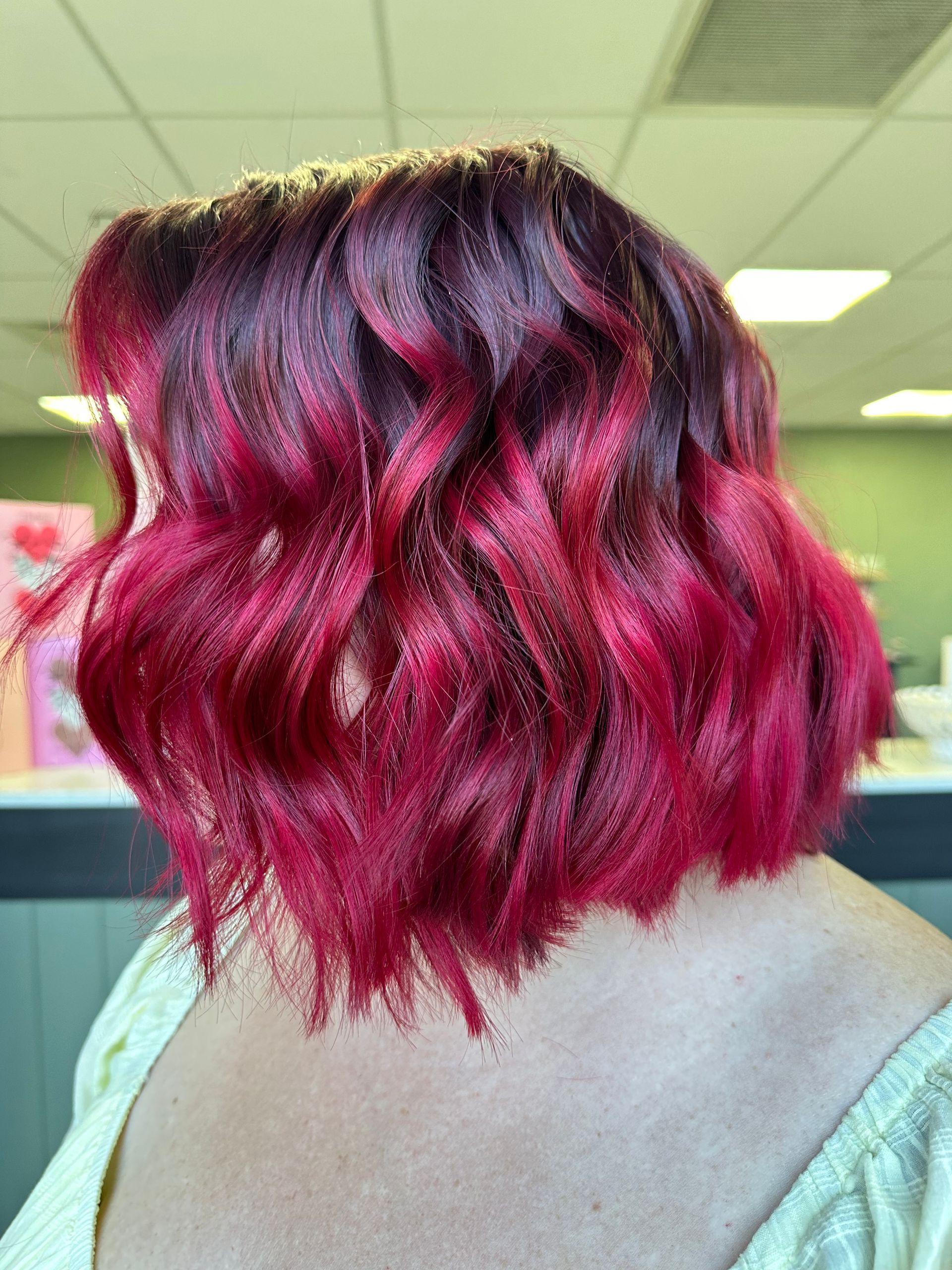 Short Wavy Hair Dyed Deep Pink With Dark Roots — Blackwell Hair In Woree, QLD