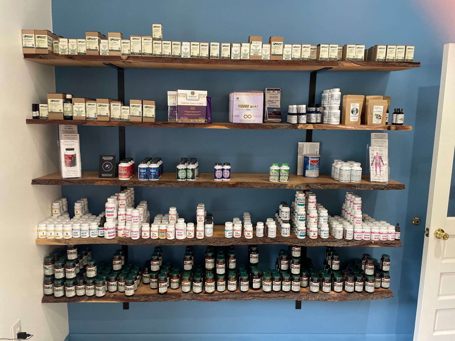 Woman Taking A Nutritional Supplement — Nicholson, PA — Optimal Whole Health & Nutrition
