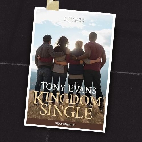 Book cover for Tony Evans’ “Kingdom Single,” showing four people standing arm in arm against a bright sky.
