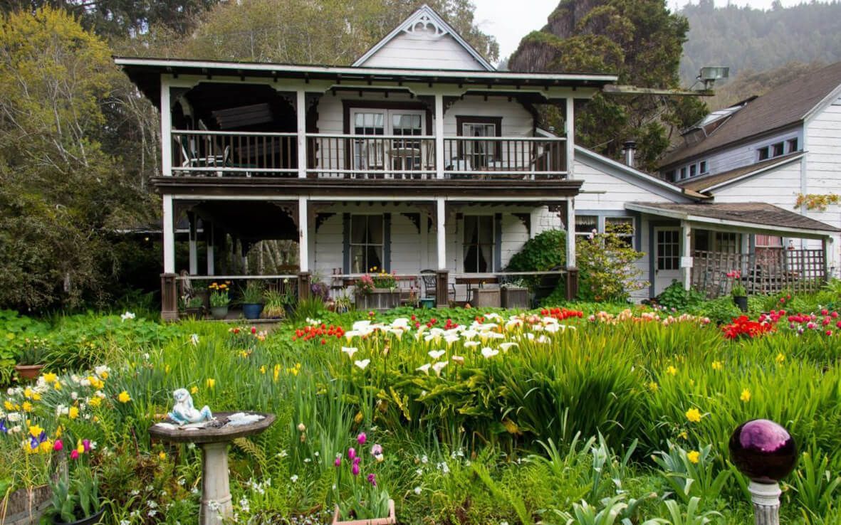 multi-story large white cabin