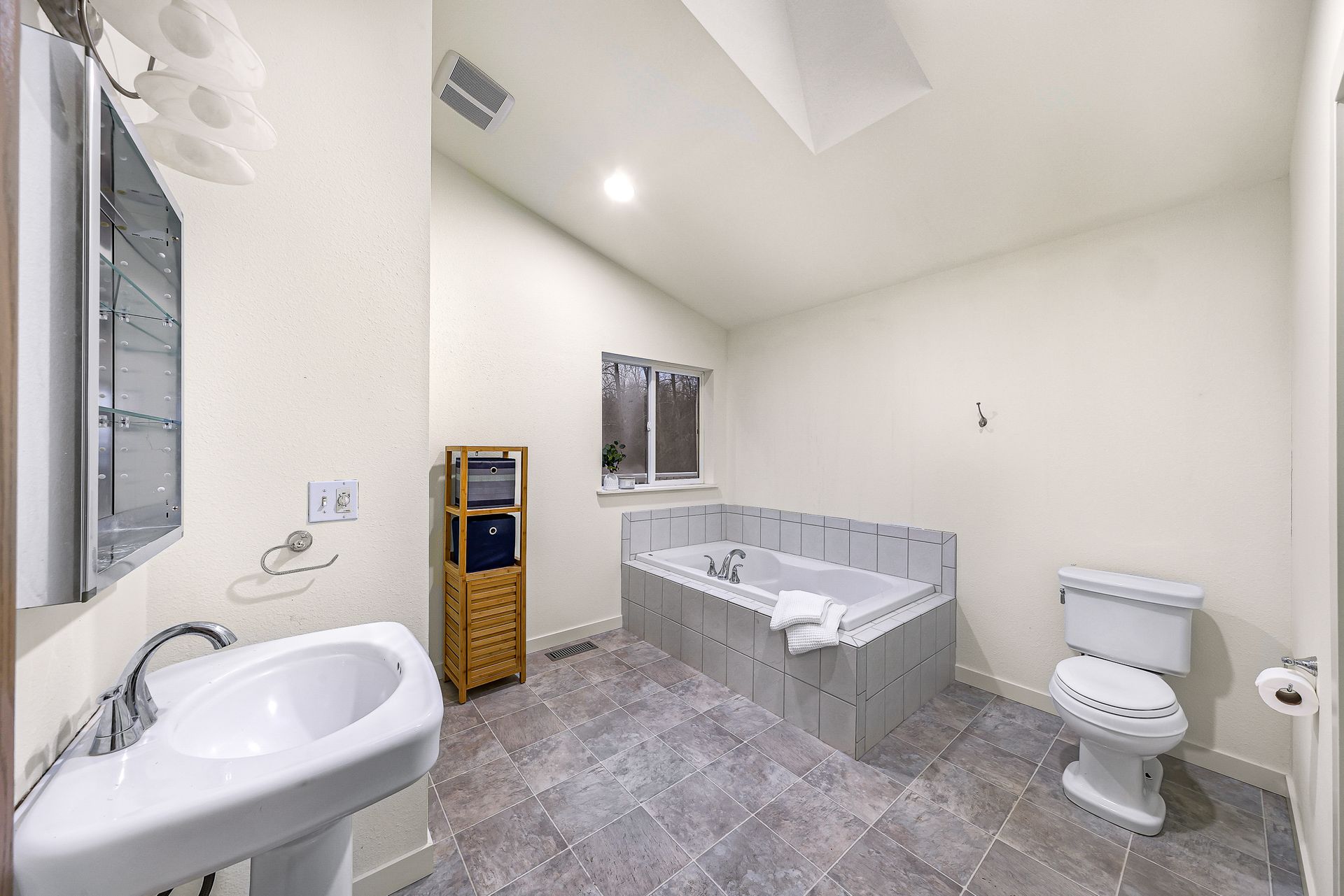 Spa-like bathroom with soaking tub and walk-in shower.
