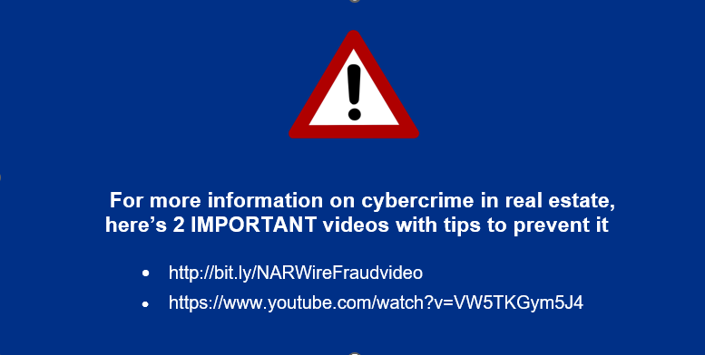 A blue screen with a warning sign that says for more information on cybercrime in real estate