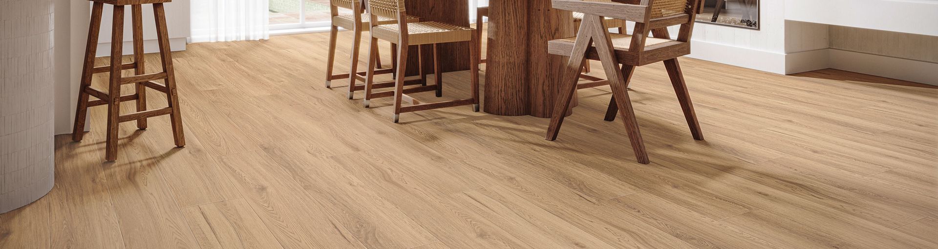 Wooden floor in a dining area, with chairs and a table made of natural wood.