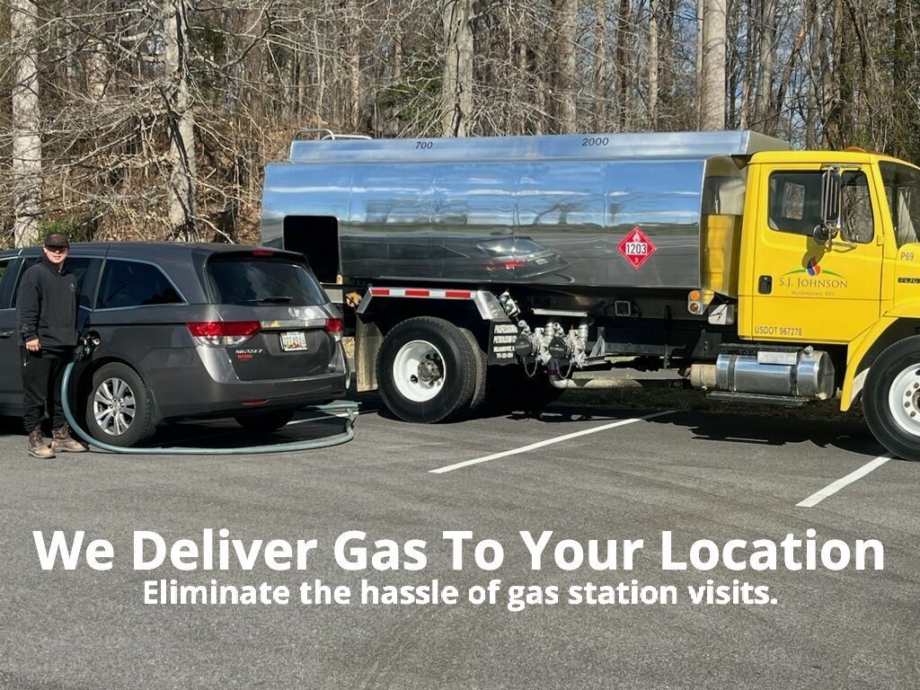 sj johnson company shown fueling a car in a parking lot