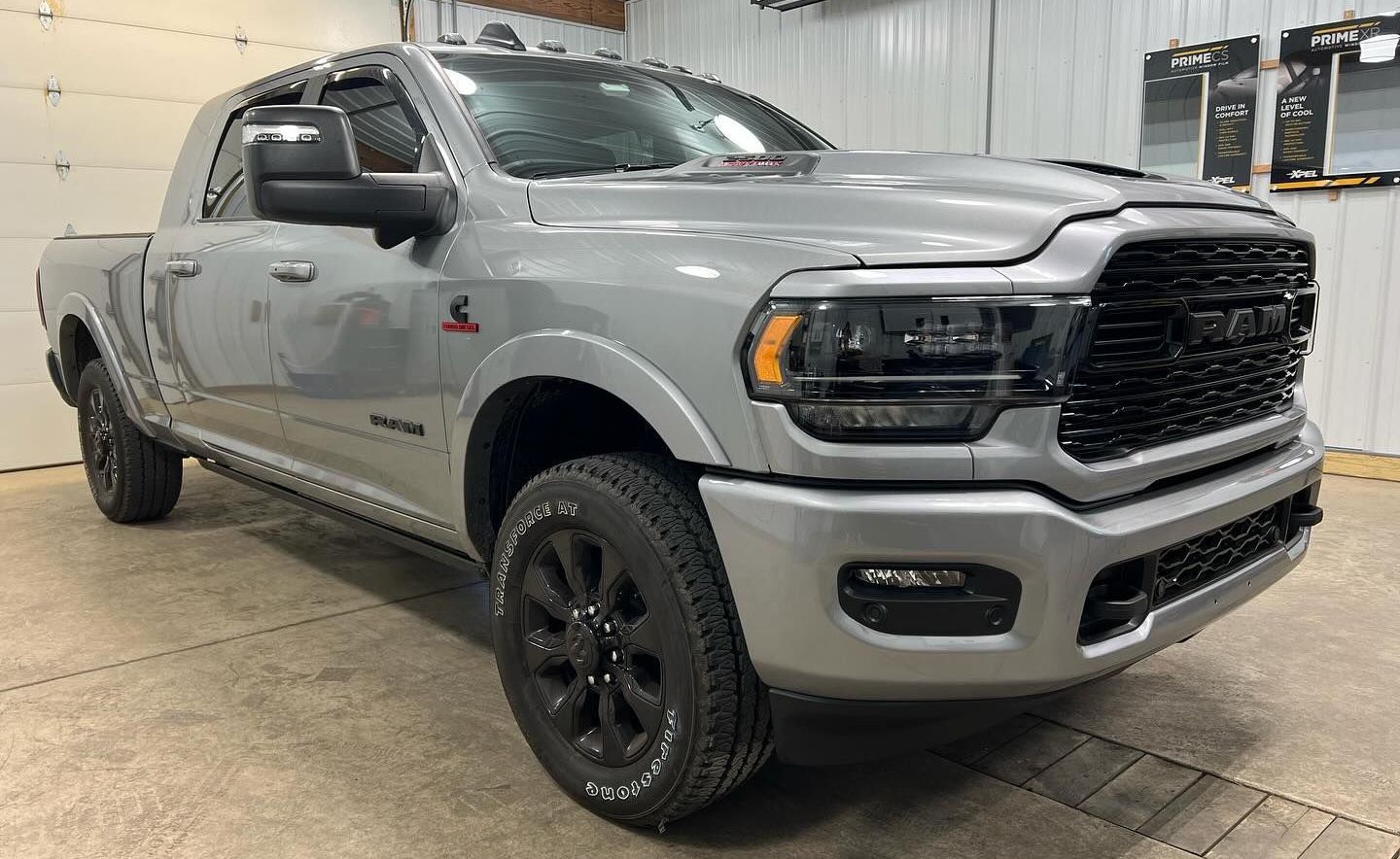 vehicle with window tinting inside a detailing shop