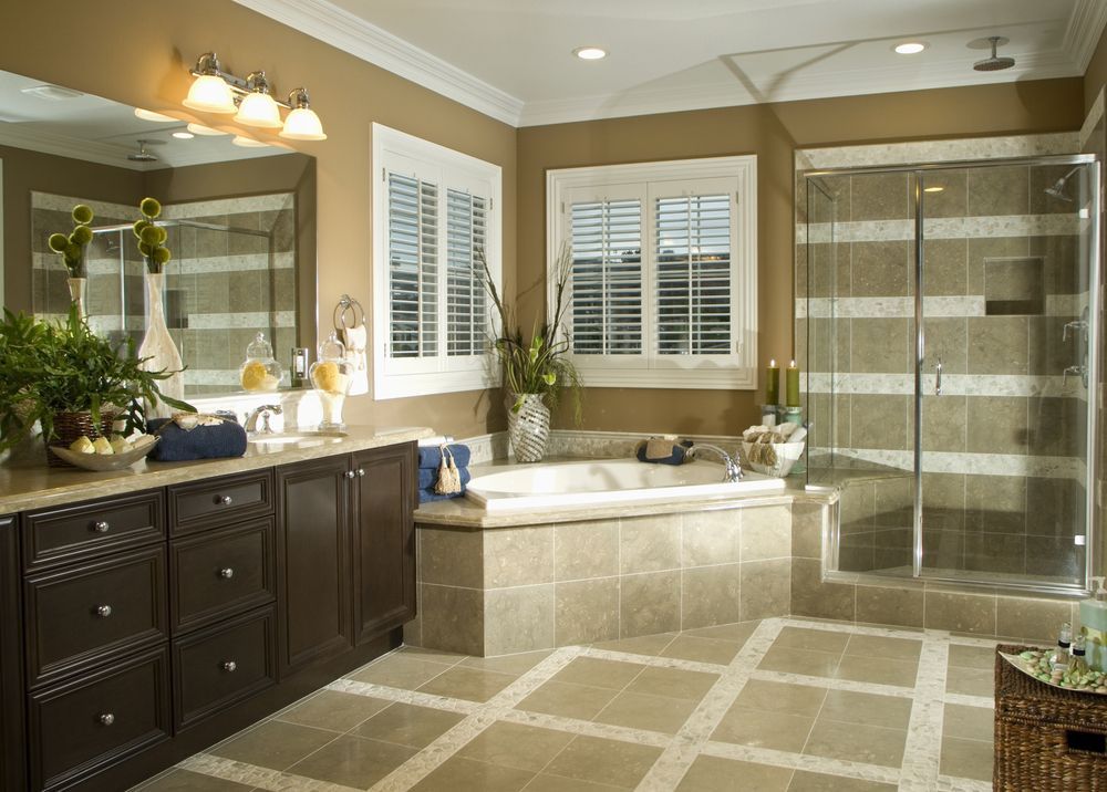 A Bathroom With a Tub and a Walk in Shower — Leemark Design Services In Gordonvale, QLD