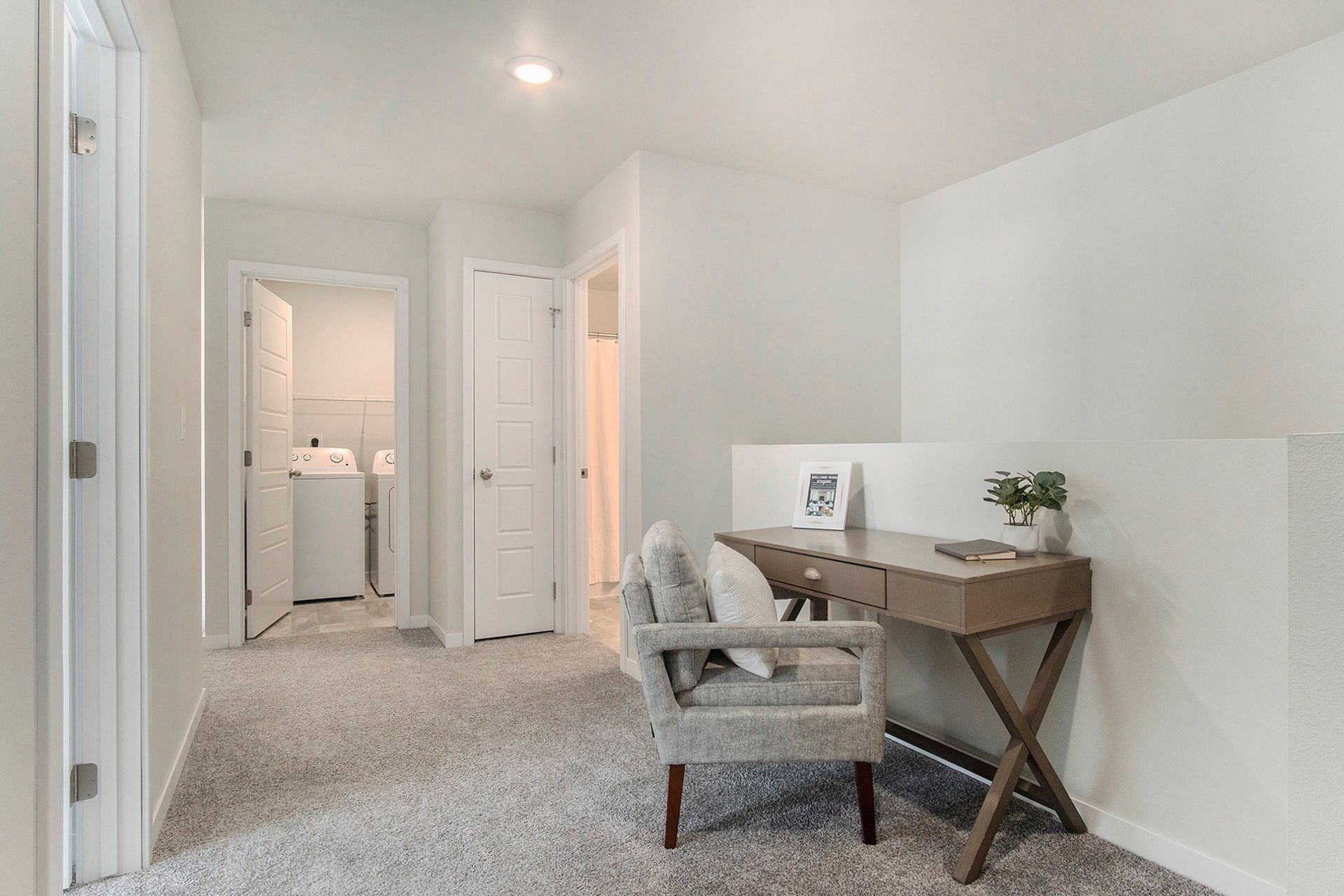 Upstairs loft area with a desk.