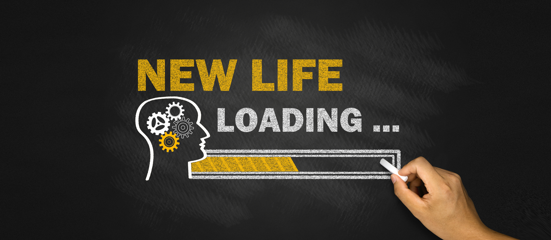 Graphic depicting a human mind with gears in it and a loading bar drawn in chalk below the words "New Life Loading"
