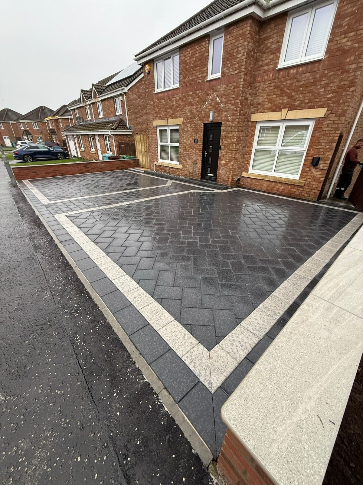 Completed multi-car Marshalls Lunar driveway across the full Glenboig property frontage