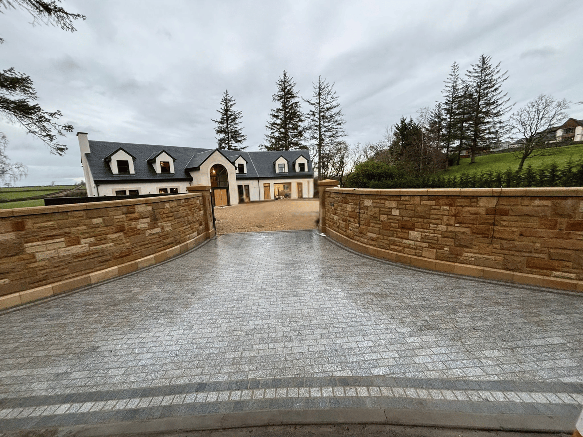 Professionally installed monoblock driveway at a Glasgow home by Pear Landscaping Group