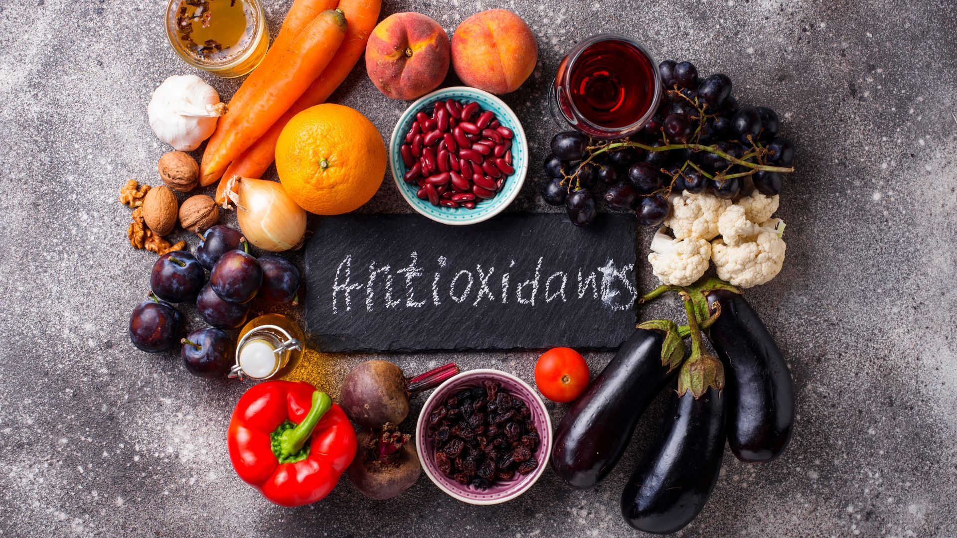 A variety of healthy foods displayed on a table, including fruits, vegetables, lean proteins, and whole grains, ideal for weight loss.