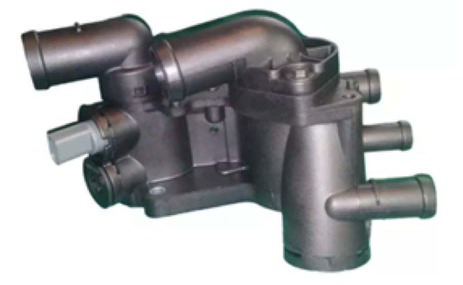 Carcasa del termostato del motor de plástico negro con múltiples mangueras.