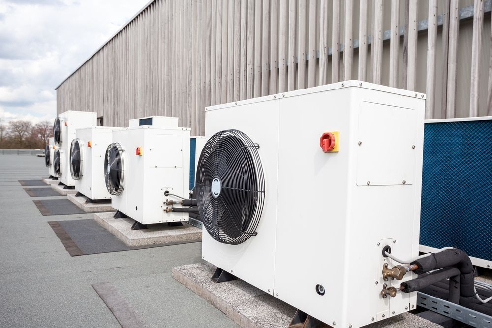 A Bunch of Air Conditioners Are Stacked on Top of Each Other — Vent Wise in Queanbeyan, NSW