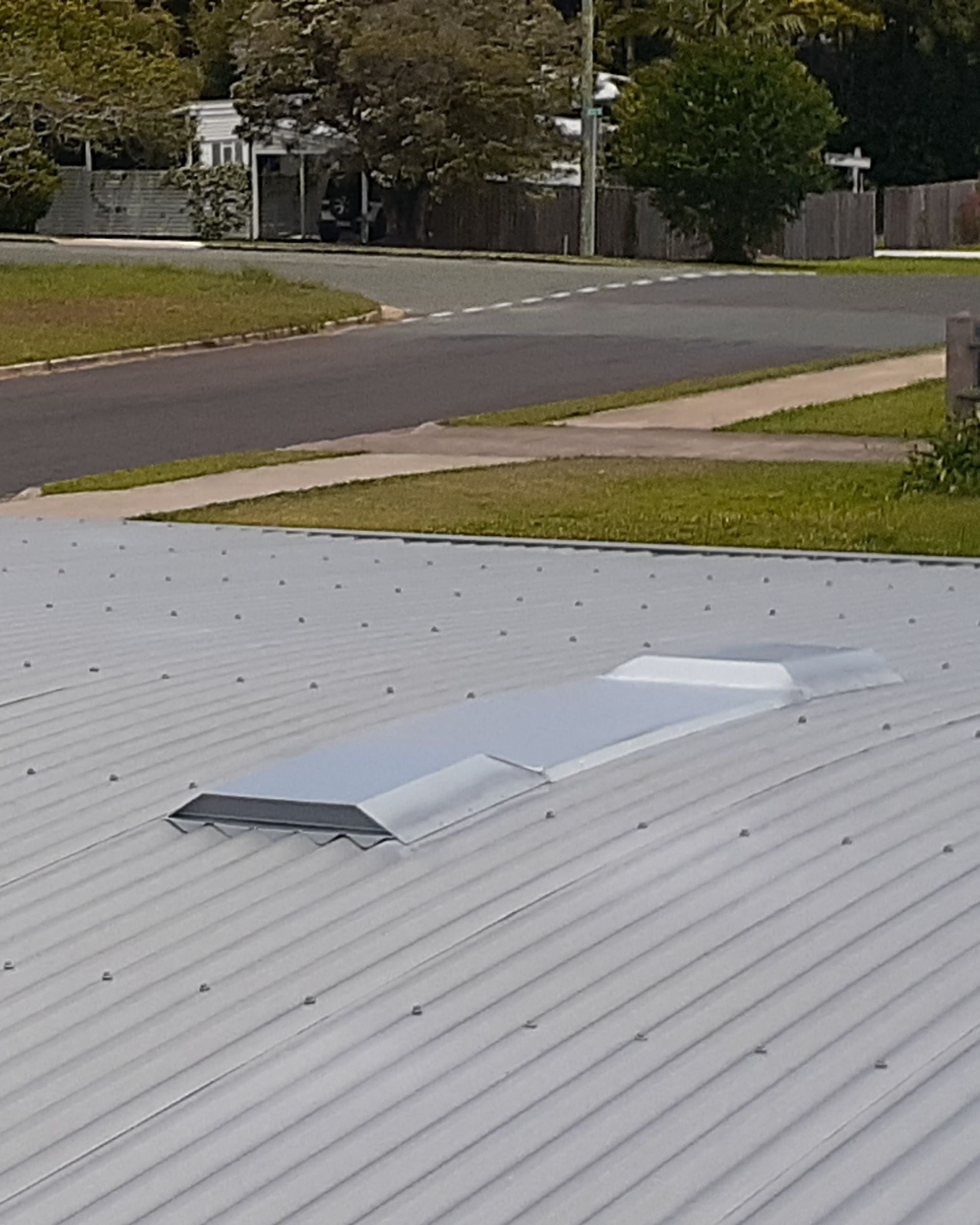 A Roof With a Ventilation System — Vent Wise in Twin Waters, QLD