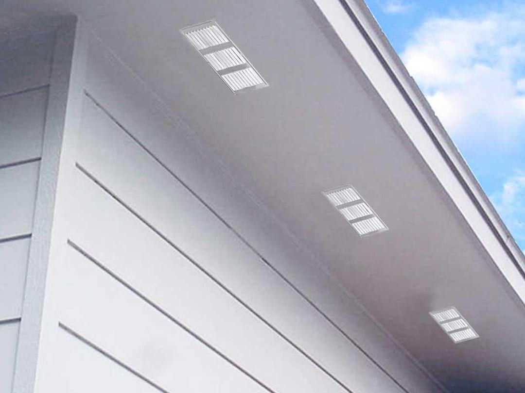 A Close Up of the Roof of a House With a White Gutter — Vent Wise in Twin Waters, QLD