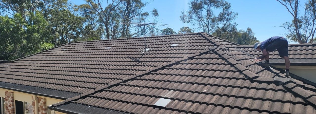 Man on A Roof Installing Vents— Vent Wise in Twin Waters, QLD