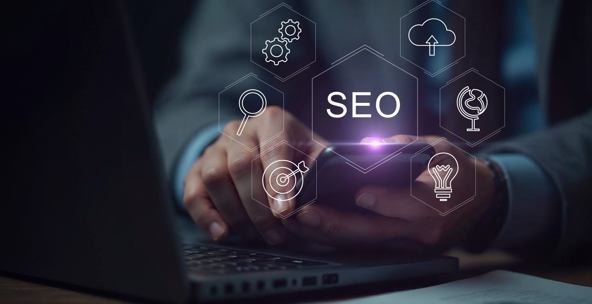 Person using phone and laptop, SEO graphic overlay.