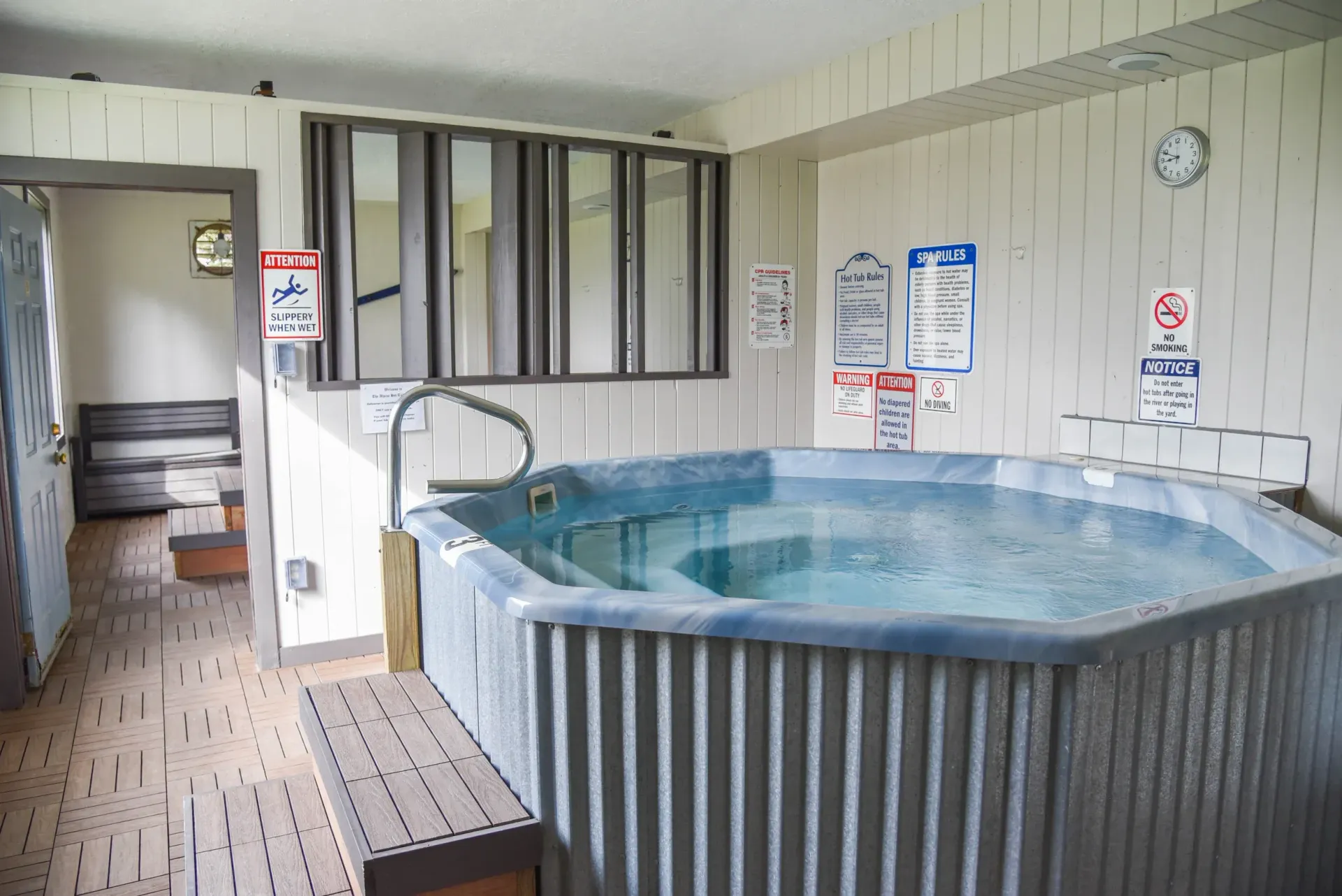 There is a hot tub in the middle of the room.