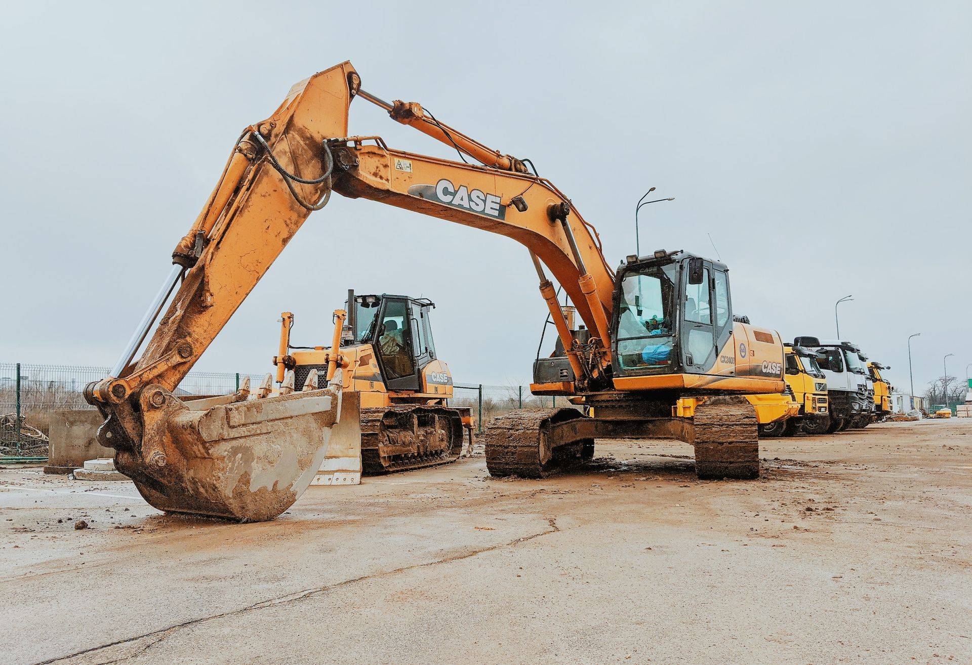 Yellow Excavator On Gray Concrete Road