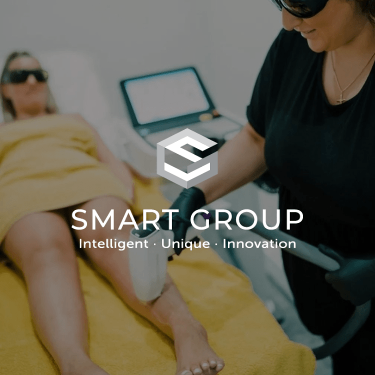A woman is getting a hair removal treatment from smart group