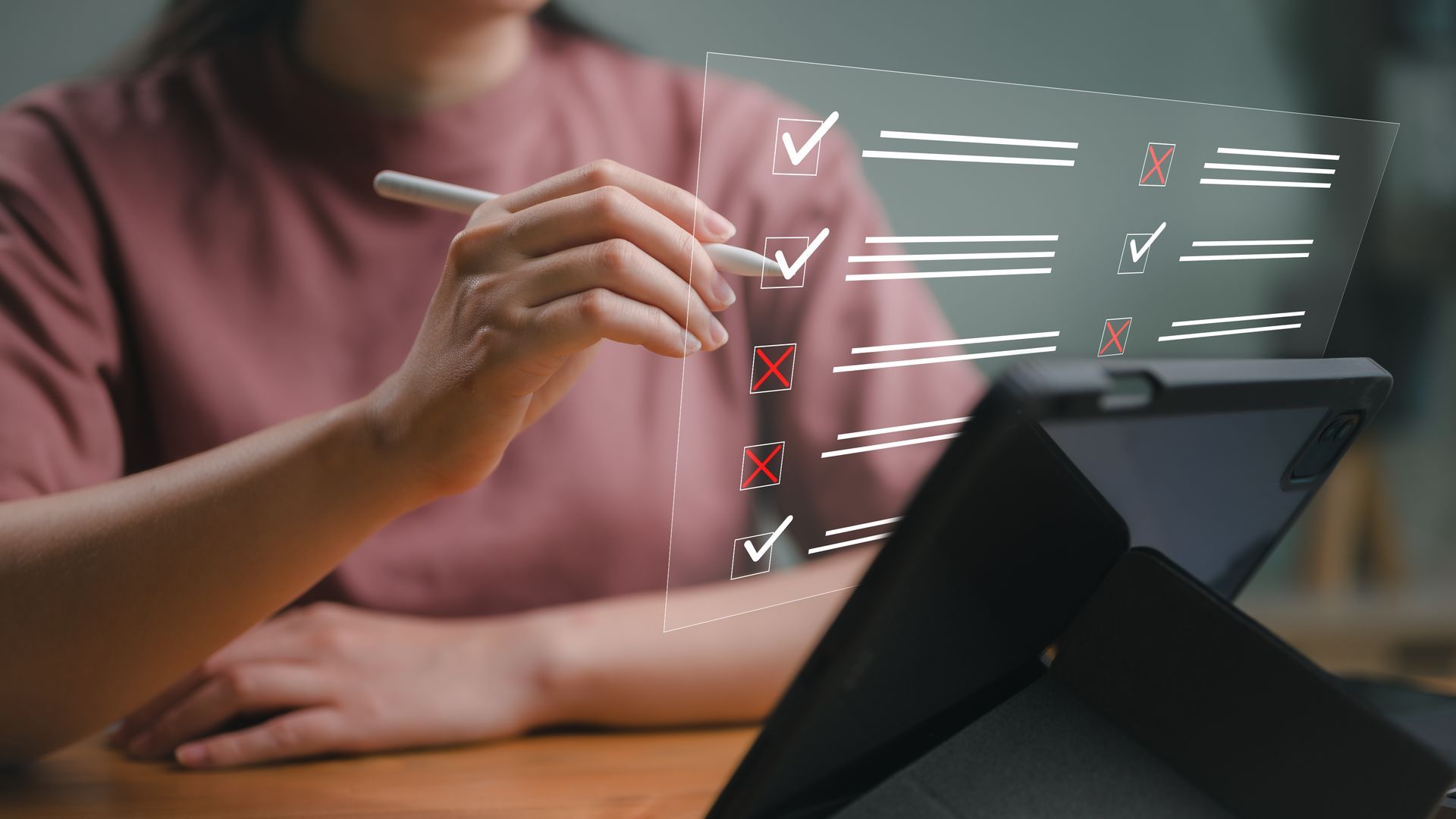 Woman using a tablet with a checklist animation coming out of the screen