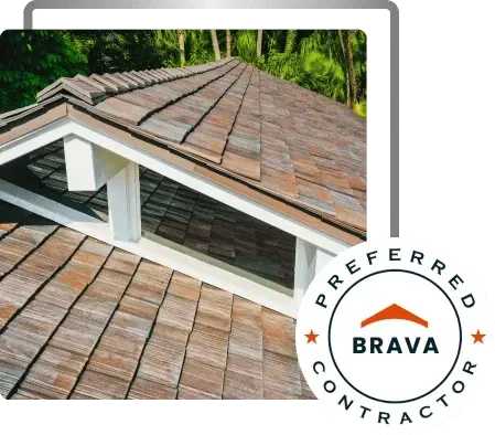 Brown shingle roof with skylight and BRAVA Preferred Contractor badge
