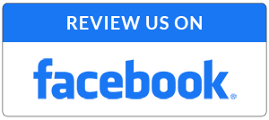 Blue and white “Review us on Facebook” button with the Facebook logo