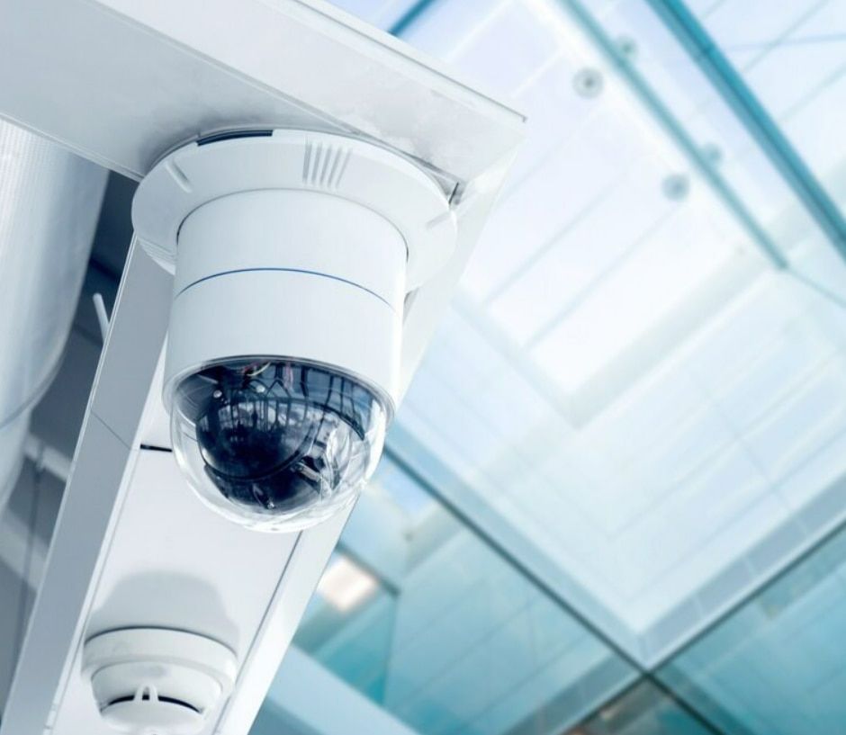 White Security Camera Mounted on a Ceiling — Stewys in Tweed Heads, NSW