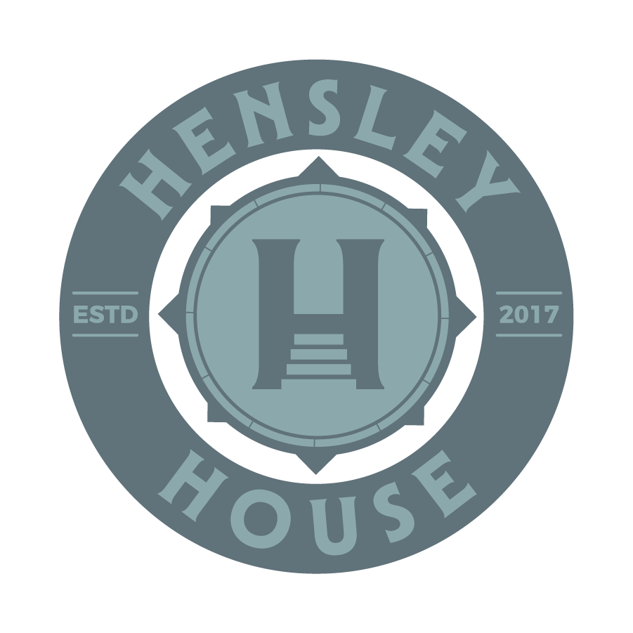A black and white logo for helm recovery on a white background.