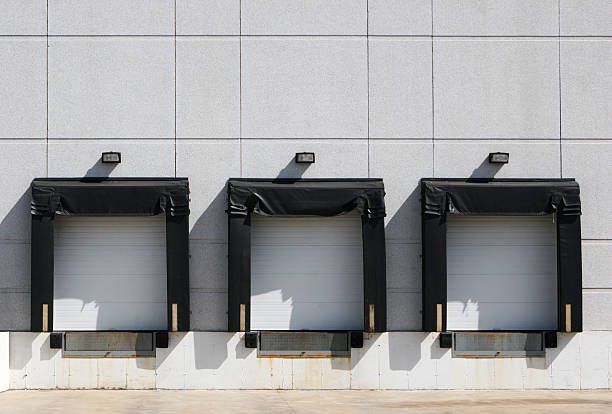 A row of loading docks on the side of a building.