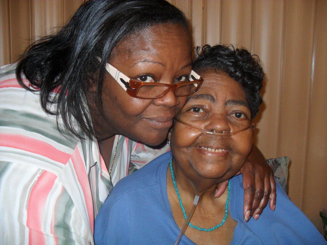 Mother and daughter hugging