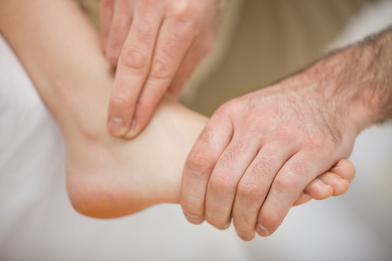 Therapist Checking the Ankle