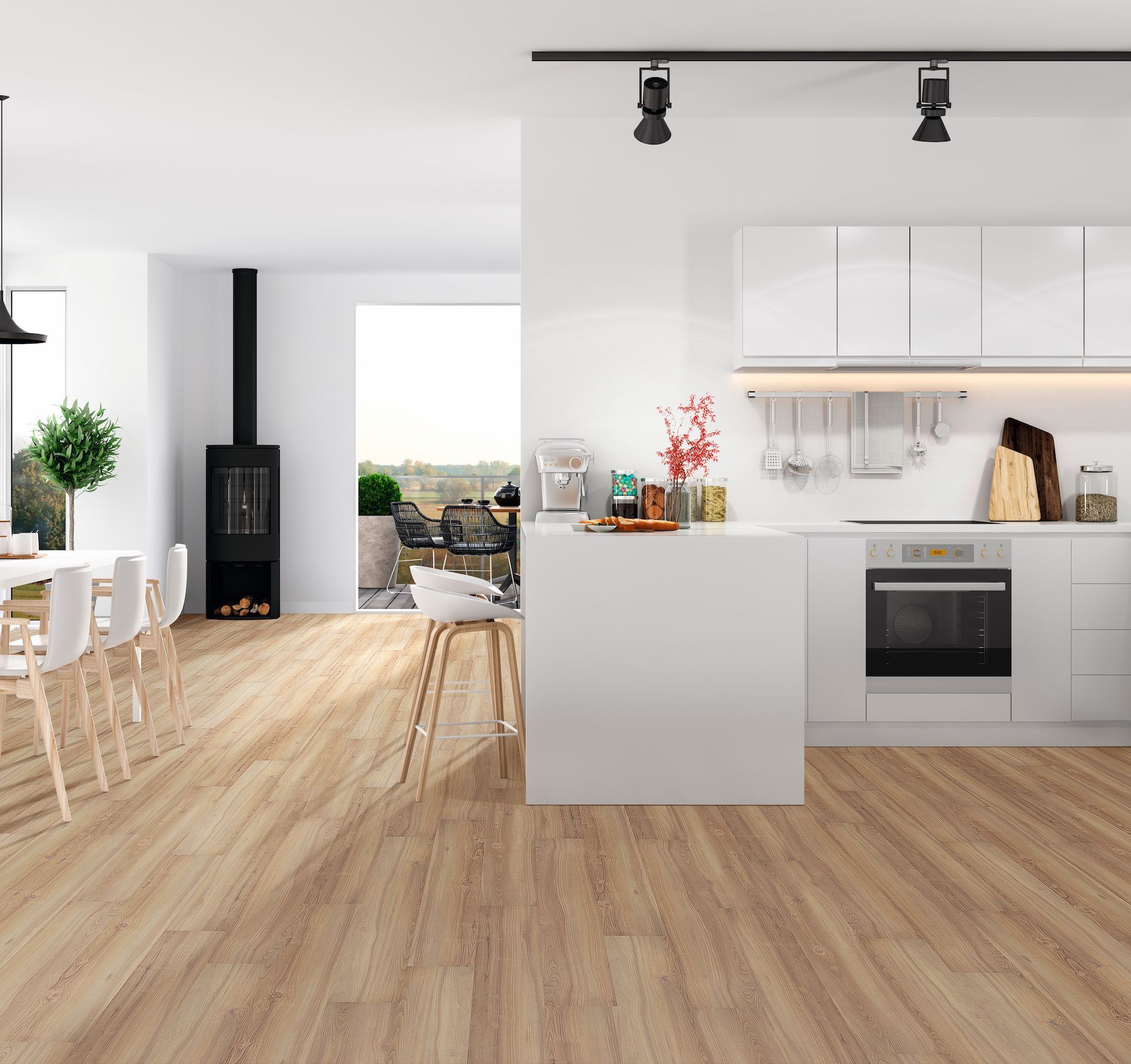 Open-concept Kitchen and Dining Area With Light Wood Floors — Hoppens Floorworld in Clifton Beach, QLD