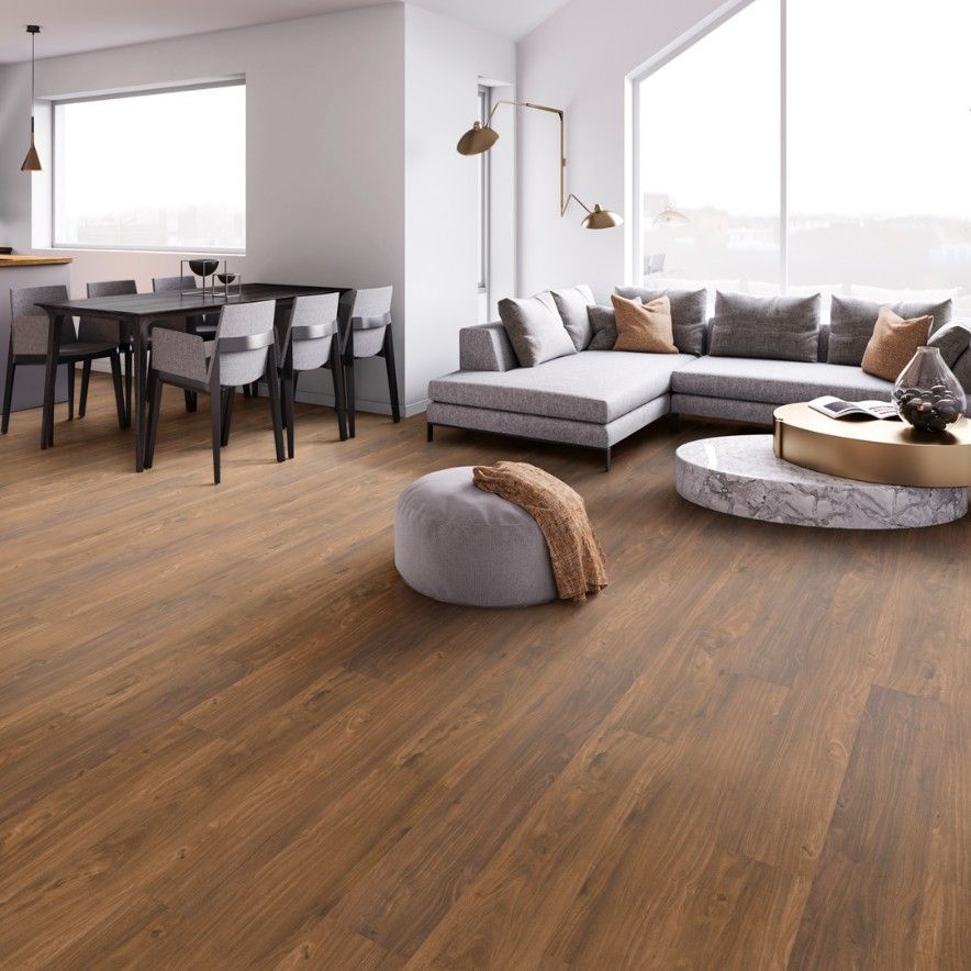 A Living Room With a Couch , Table and Chairs — Hoppens Floorworld in Manunda, QLD