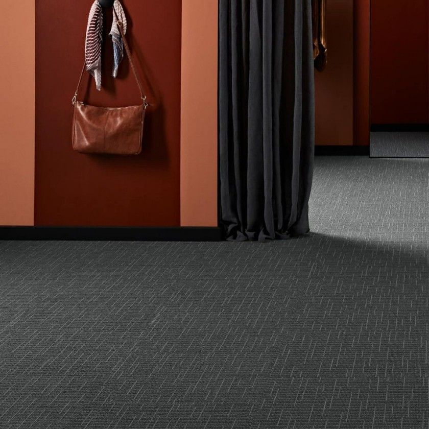 A Purse is Hanging on a Wall in a Dressing Room — Hoppens Floorworld in Manunda, QLD