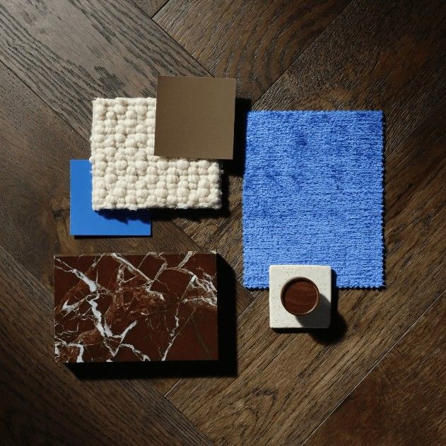 A Wooden Floor With a Variety of Samples on It — Hoppens Floorworld in Bayview Heights, QLD