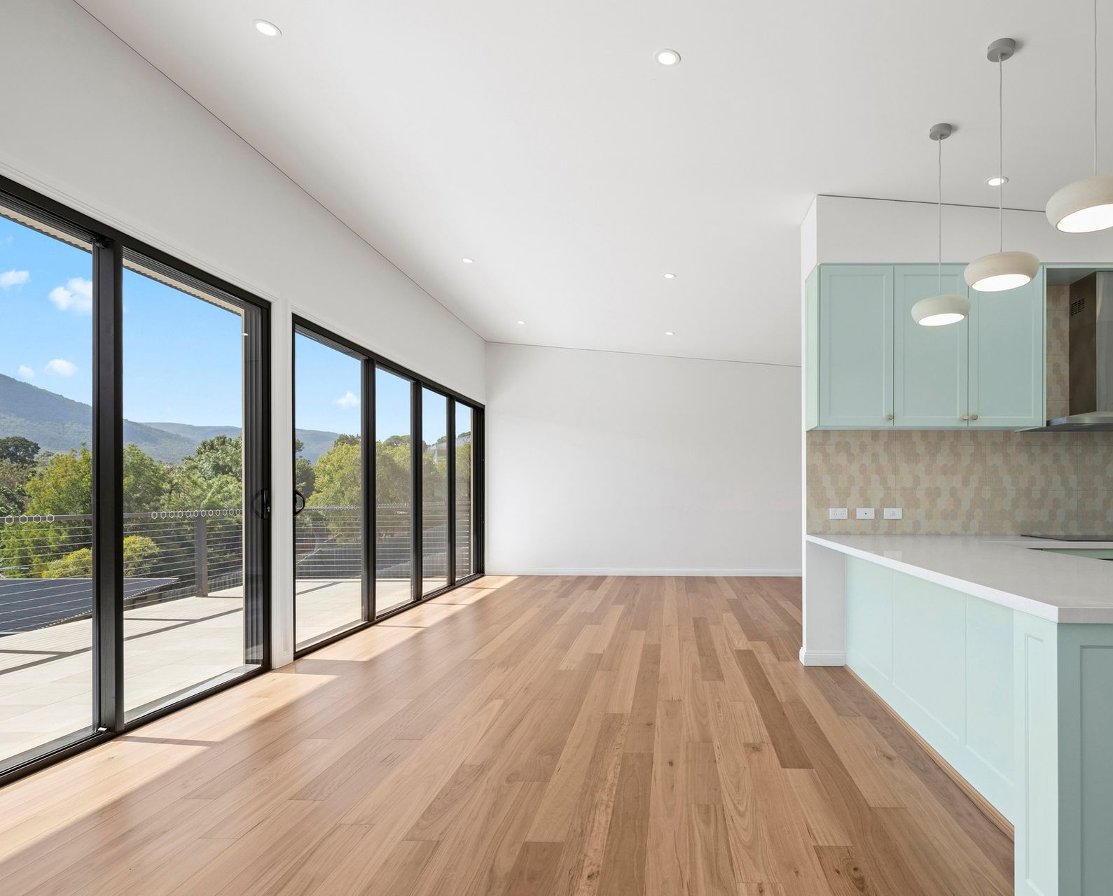 A Living Room With a Couch and a Small Table — Hoppens Floorworld in Manunda, QLD