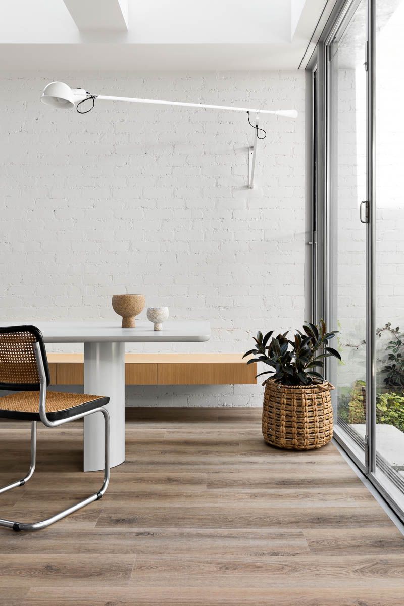 A Room With a Wooden Floor and a Radiator — Hoppens Floorworld in Manunda, QLD
