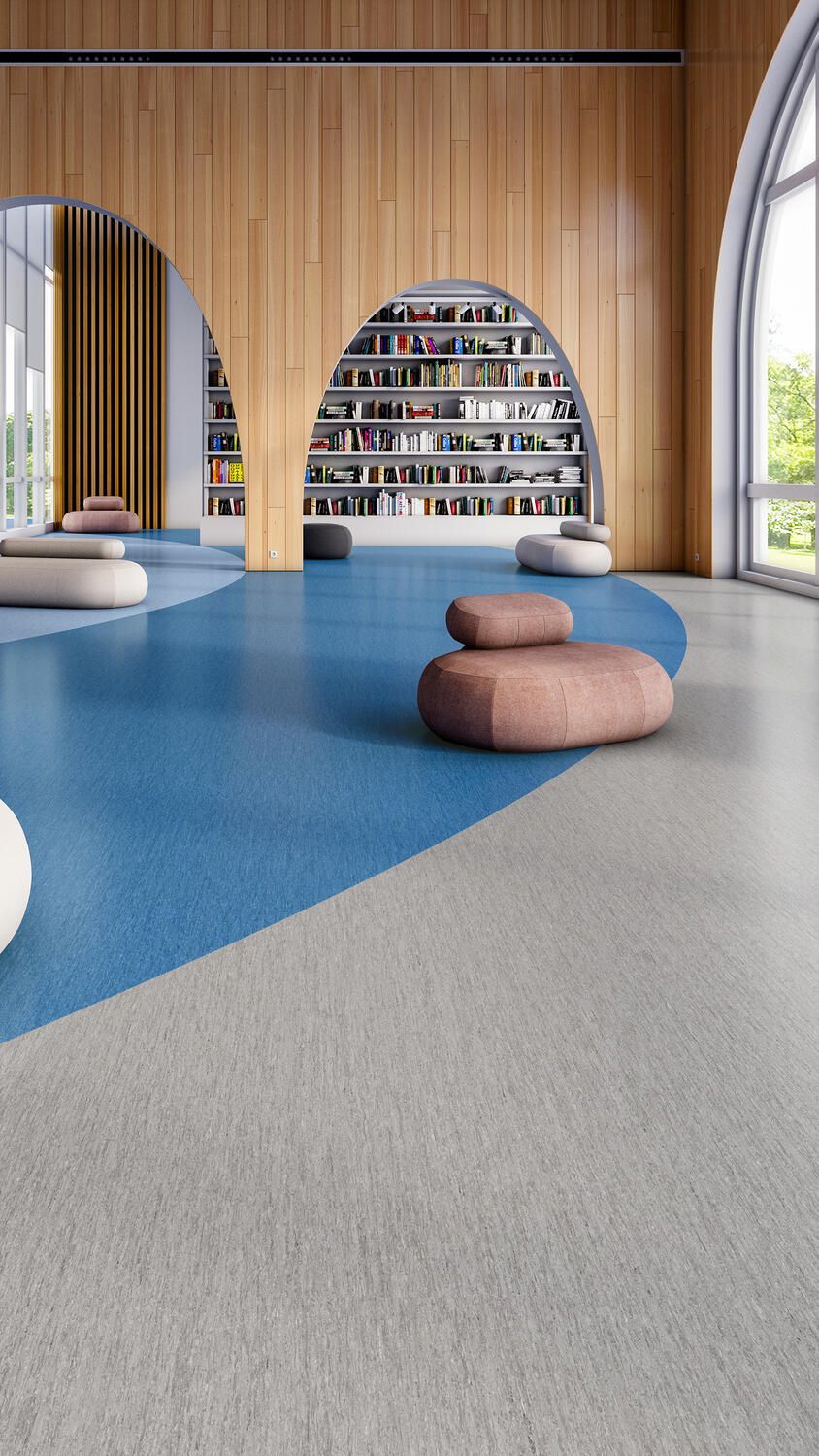 Modern library lounge with wood walls, blue carpet, arched windows, and round cushioned seating. — Hoppens Floorworld in Manunda, QLD