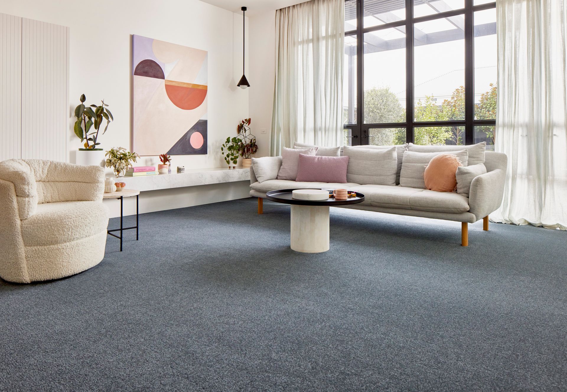 A White Rug is Sitting on a Wooden Floor — Hoppens Floorworld in Manunda, QLD