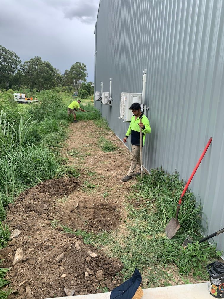 A person doing property maintenance in Brisbane